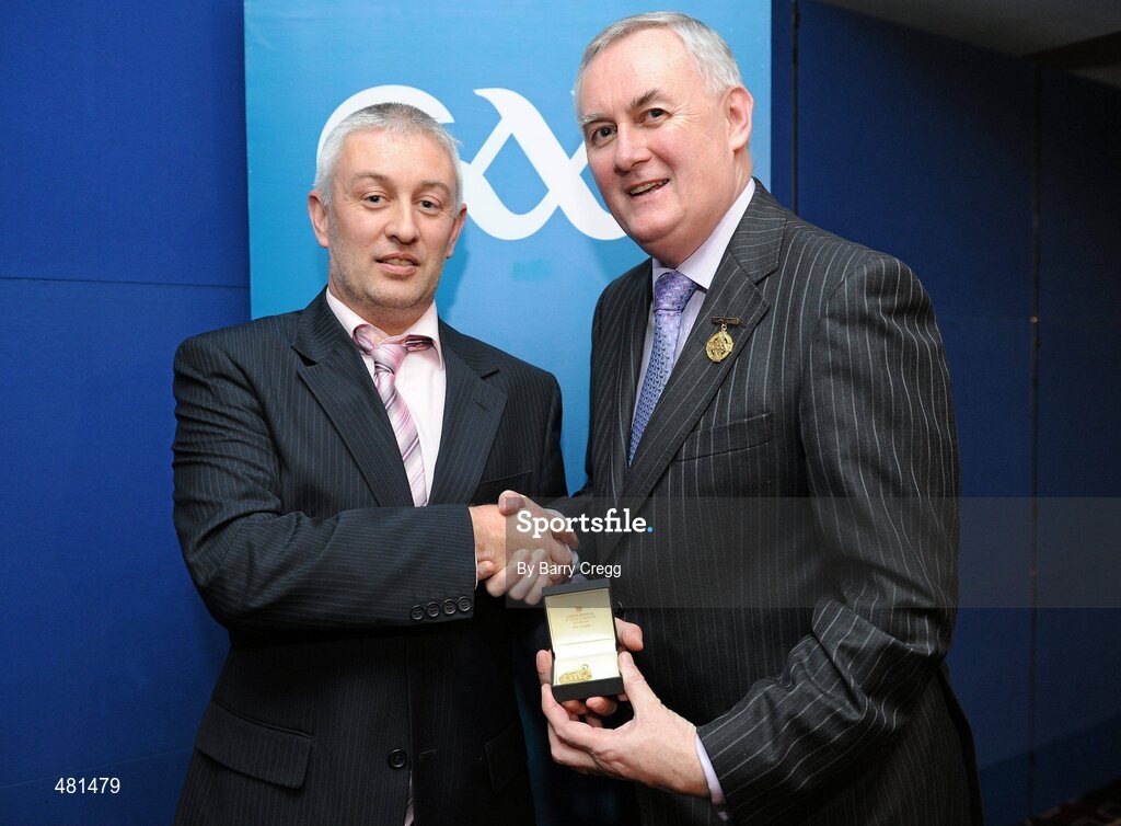 15 January 2011; Referee David Copps, from Co. Cork, who refereed the AIB GAA Hurling All-Ireland Intermediate Club Championship 2009/2010, is presented with his  referee's award by Uachtarán CLG Criostóir Ó Cuana. 2010 National Referees' Awards Banquet, Croke Park, Dublin. Picture credit: Barry Cregg / SPORTSFILE