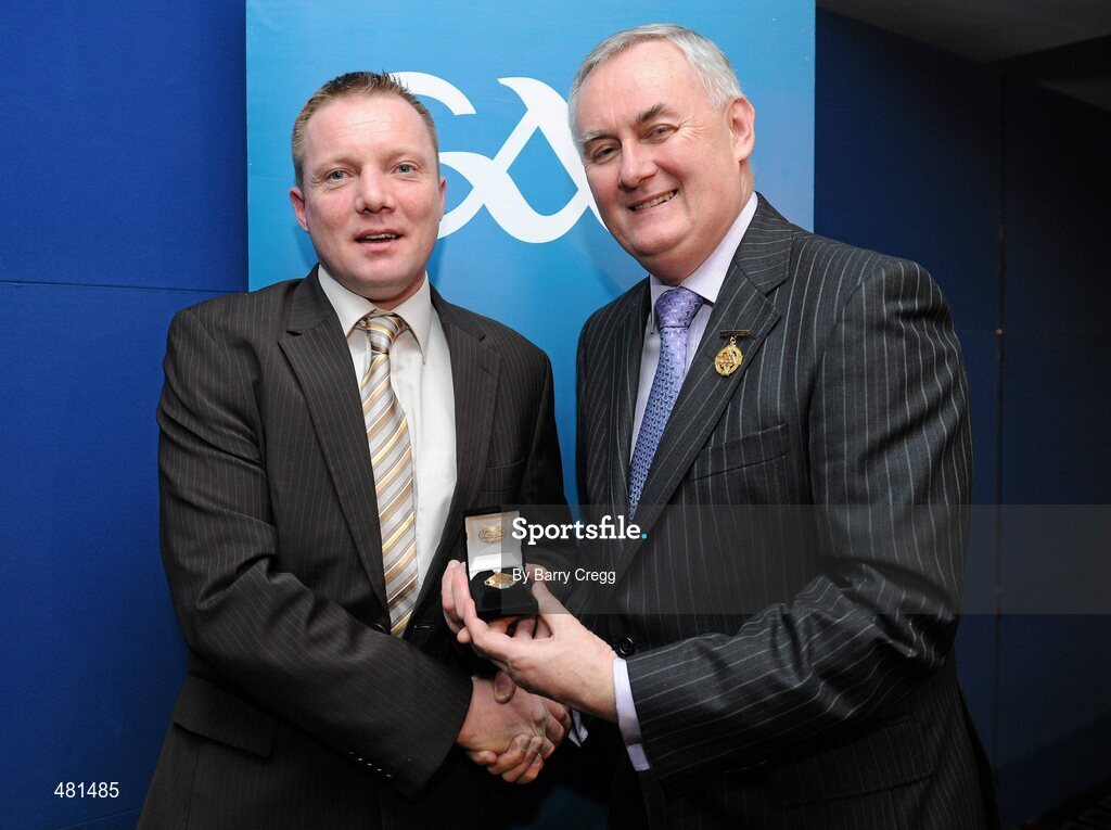 15 January 2011; Referee Eamon Hassen, from Co. Derry, who refereed the Allianz GAA Hurling National League Division 4, is presented with his  referee's award by Uachtarán CLG Criostóir Ó Cuana. 2010 National Referees' Awards Banquet, Croke Park, Dublin. Picture credit: Barry Cregg / SPORTSFILE
