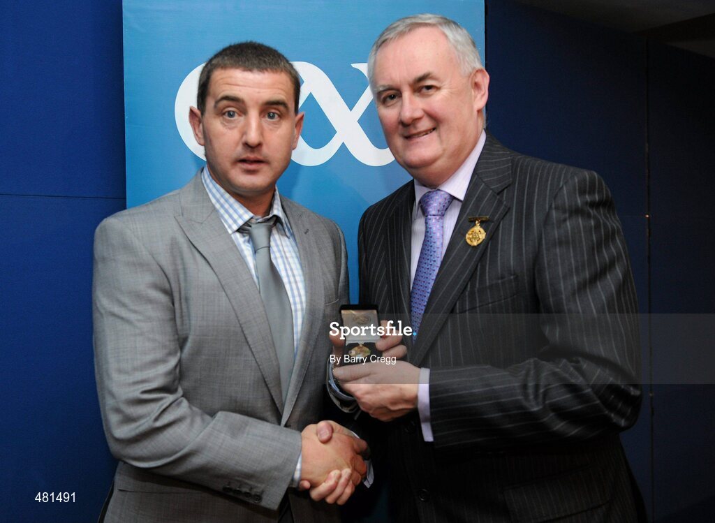 15 January 2011; Referee Robert O'Donnell, from Co. Donegal, who refereed the Allianz GAA Hurling National League Division 4, is presented with his  referee's award by Uachtarán CLG Criostóir Ó Cuana. 2010 National Referees' Awards Banquet, Croke Park, Dublin. Picture credit: Barry Cregg / SPORTSFILE