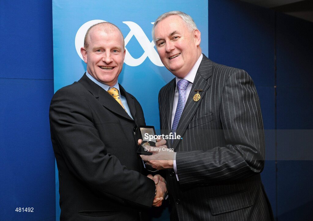 15 January 2011; Referee Maurice Condon, from Co. Waterford, who refereed the Allianz GAA Hurling National League Division 3, is presented with his  referee's award by Uachtarán CLG Criostóir Ó Cuana. 2010 National Referees' Awards Banquet, Croke Park, Dublin. Picture credit: Barry Cregg / SPORTSFILE
