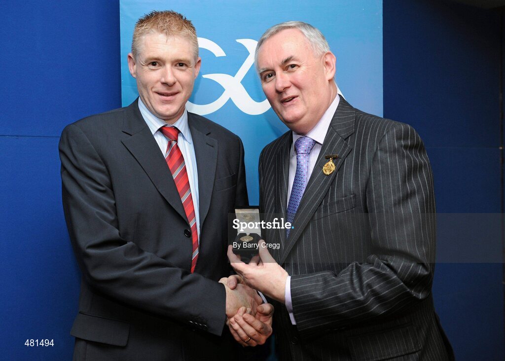 15 January 2011; Referee Fergus Smith, from Co. Meath, who refereed the ESB GAA Hurling Minor B Championship, is presented with his  referee's award by Uachtarán CLG Criostóir Ó Cuana. 2010 National Referees' Awards Banquet, Croke Park, Dublin. Picture credit: Barry Cregg / SPORTSFILE