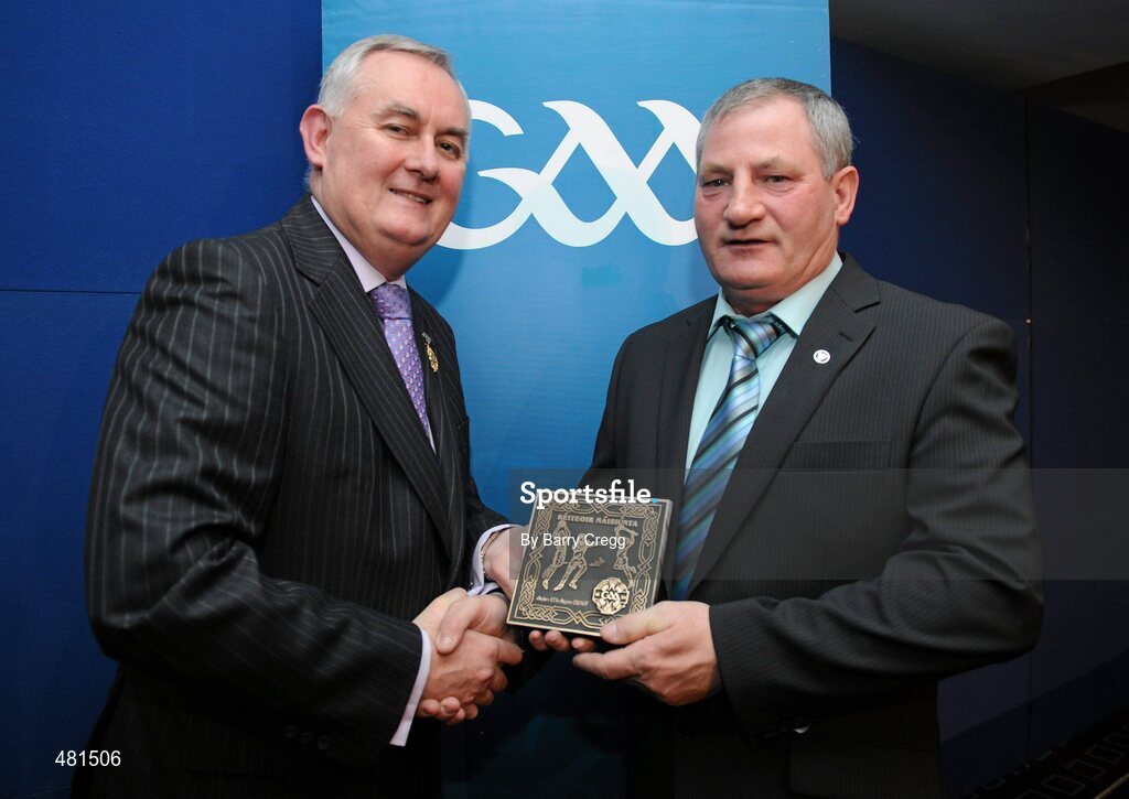 15 January 2011; Retiring referee Aidan McAlynn, from Co. Derry, is presented with his  referee's award by Uachtarán CLG Criostóir Ó Cuana. 2010 National Referees' Awards Banquet, Croke Park, Dublin. Picture credit: Barry Cregg / SPORTSFILE
