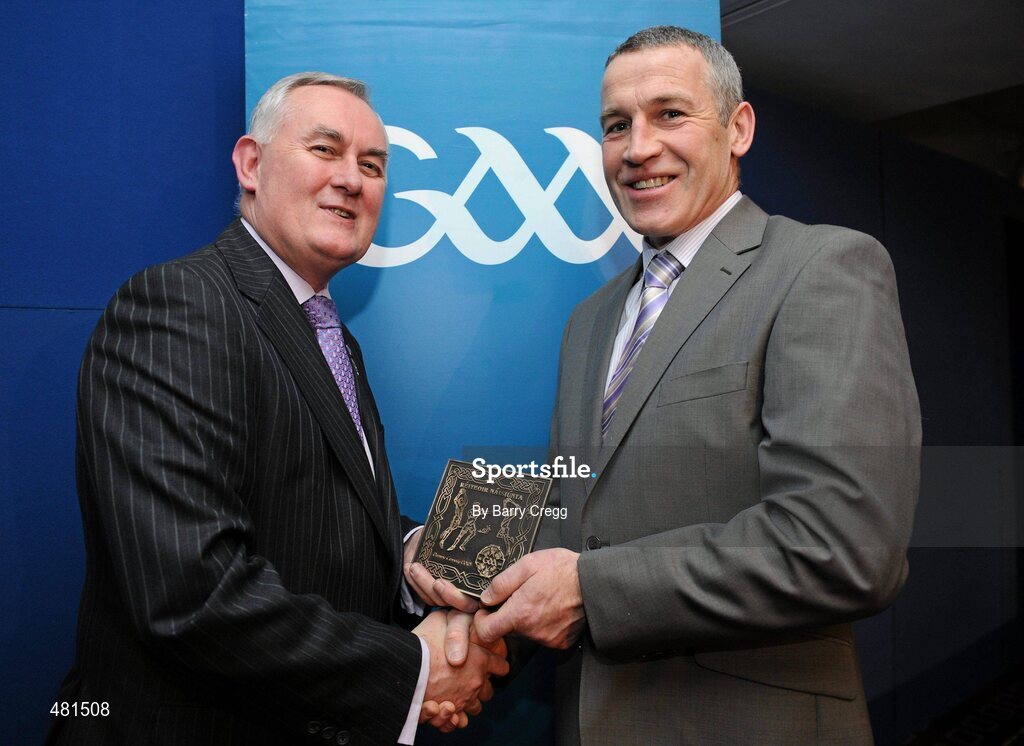 15 January 2011; Retiring referee Dominic Connolly, from Co. Kilkenny, is presented with his  referee's award by Uachtarán CLG Criostóir Ó Cuana. 2010 National Referees' Awards Banquet, Croke Park, Dublin. Picture credit: Barry Cregg / SPORTSFILE