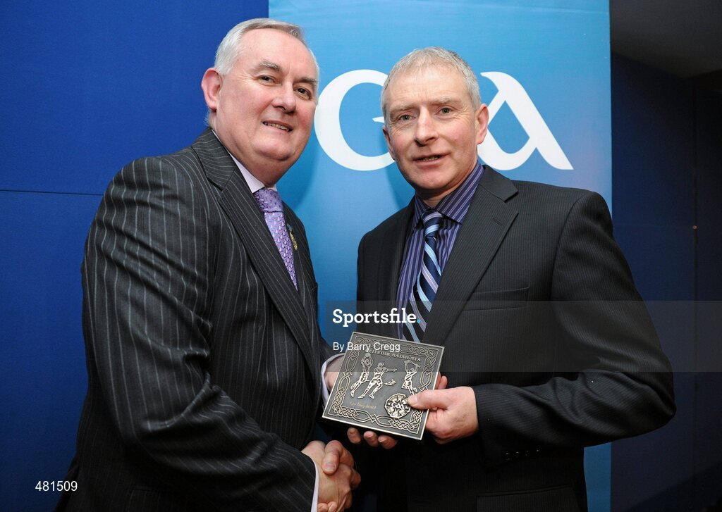 15 January 2011; Retiring referee Ger Hoey, from Co. Clare, is presented with his  referee's award by Uachtarán CLG Criostóir Ó Cuana. 2010 National Referees' Awards Banquet, Croke Park, Dublin. Picture credit: Barry Cregg / SPORTSFILE