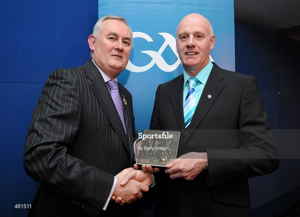 15 January 2011; Retiring referee Jim O'Rourke, from Co. Monaghan, is presented with his  referee's award by Uachtarán CLG Criostóir Ó Cuana. 2010 National Referees' Awards Banquet, Croke Park, Dublin. Picture credit: Barry Cregg / SPORTSFILE