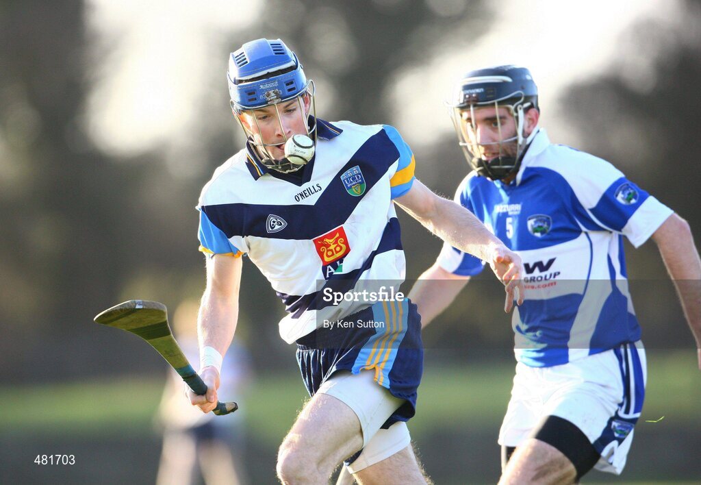 16 January 2011; Kevin O'Loughlin, UCD, in action against Michael Birmingham, Laois. Walsh Cup, 1st Round, Laois v UCD, Rathdowney GAA Grounds, Rathdowney, Co. Laois. Picture credit: Ken Sutton / SPORTSFILE