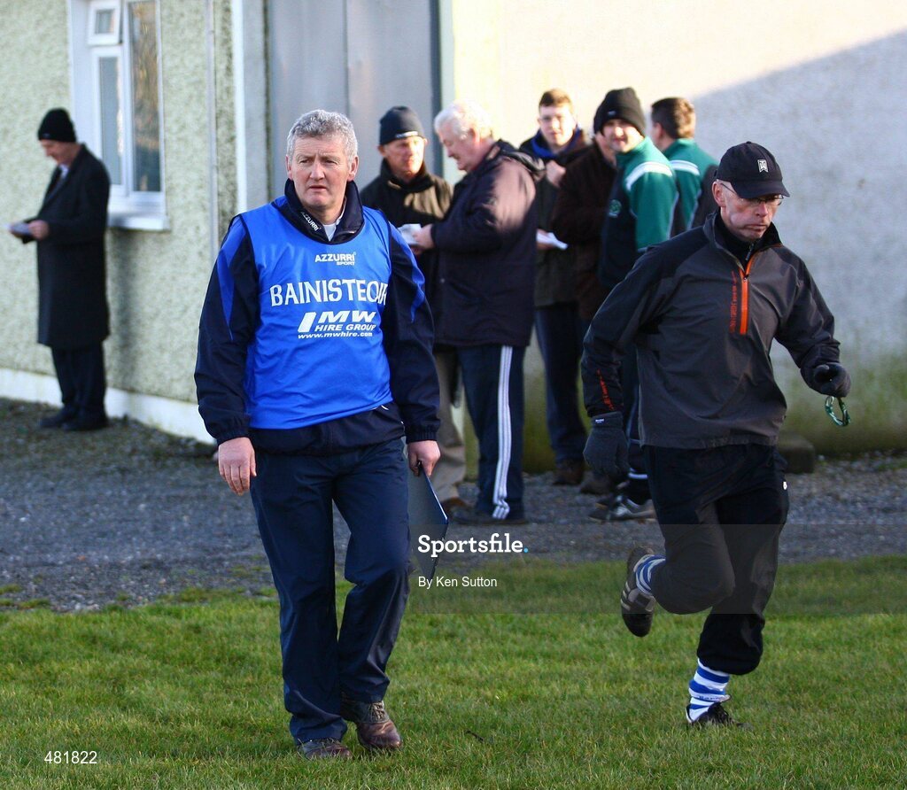16 January 2011; Laois manager Brendan Fennelly, left, takes to the pitch for his first game in charge. Walsh Cup, 1st Round, Laois v UCD, Rathdowney GAA Grounds, Rathdowney, Co. Laois. Picture credit: Ken Sutton / SPORTSFILE