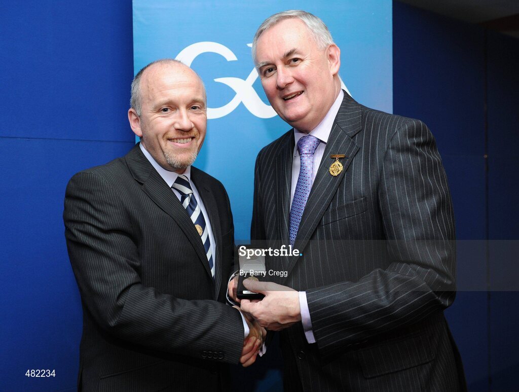 15 January 2011; Referee Marty Duffy, from Co. Sligo, who refereed the Cadburys GAA Football All-Ireland U21 Chamionship, is presented with his  referee's award by Uachtarán CLG Criostóir Ó Cuana. 2010 National Referees' Awards Banquet, Croke Park, Dublin. Picture credit: Barry Cregg / SPORTSFILE