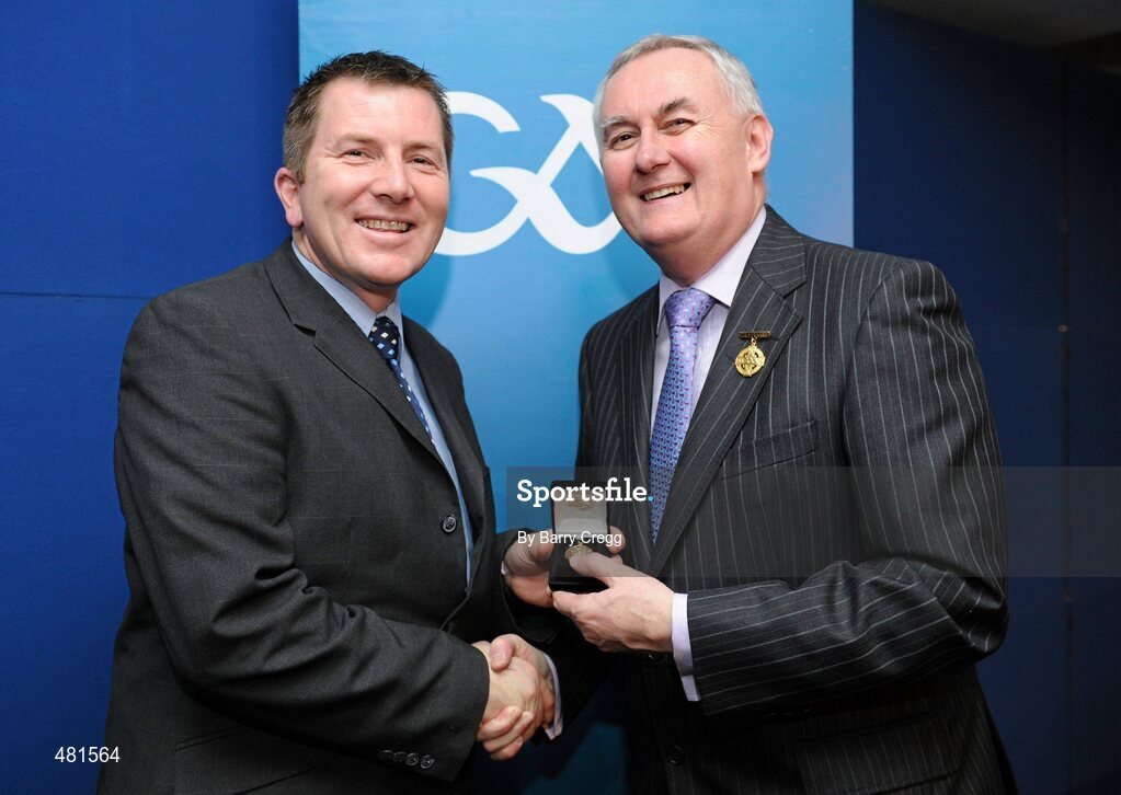 15 January 2011; Referee Ray Matthews, from Co. Antrim, who refereed the Lory Meagher Cup, is presented with his  referee's award by Uachtarán CLG Criostóir Ó Cuana. 2010 National Referees' Awards Banquet, Croke Park, Dublin. Picture credit: Barry Cregg / SPORTSFILE