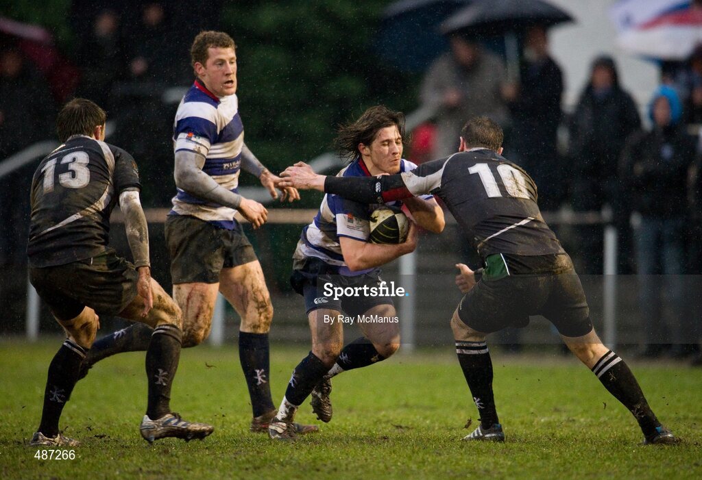 5 February 2011; Jan Byrne, Blackrock College, supported by Rob Keogh, is tackled by Conal Keane and John Kennedy, left, Old Belvedere. Ulster Bank All-Ireland League Division 1A, Old Belvedere v Blackrock College RFC, Anglesea Road, Ballsbridge, Dublin. Picture credit: Ray McManus / SPORTSFILE