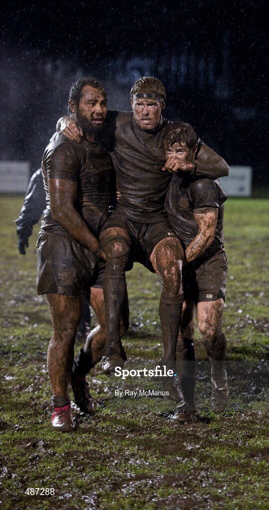5 February 2011; Old Belvedere captain Andy Dunne, right, and Leo Auva'a carry their team-mate Karl Miller off the pitch after the game. Ulster Bank All-Ireland League Division 1A, Old Belvedere v Blackrock College RFC, Anglesea Road, Ballsbridge, Dublin. Picture credit: Ray McManus / SPORTSFILE