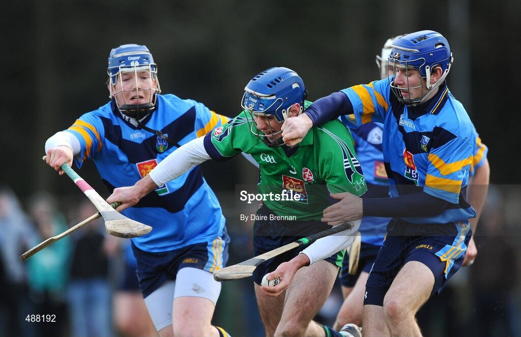 8 February 2011; Ciarán Cowan, Limerick IT, in action against Walter Walsh, left, and Kevin O'Loughlin, UCD. Ulster Bank Fitzgibbon Cup Group 2, UCD v Limerick IT, UCD, Belfield, Dublin. Picture credit: Dáire Brennan / SPORTSFILE
