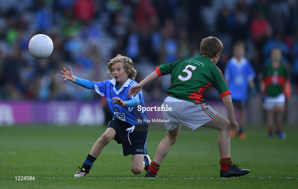 1 October 2016; Padraic Kehoe, O'Dwyers GAA, Balbriggan, Dublin, in action against Lucas Kenny, Crimlin NS, Castlebar, Mayo, during the INTO Cumann na mBunscol GAA Respect Exhibition Go Games at the GAA Football All-Ireland Senior Championship Final Replay match between Dublin and Mayo at Croke Park in Dublin. Photo by Ray McManus/Sportsfile