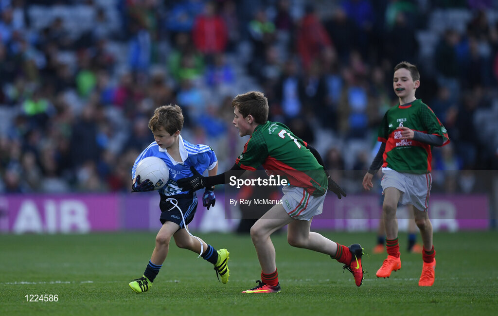 1 October 2016; Cathal Martin, Naomh Jude GAA, Templeogue, Dublin, in action against Ian Lavelle, Bohola NS, Bohola, Mayo, during the INTO Cumann na mBunscol GAA Respect Exhibition Go Games at the GAA Football All-Ireland Senior Championship Final Replay match between Dublin and Mayo at Croke Park in Dublin. Photo by Ray McManus/Sportsfile