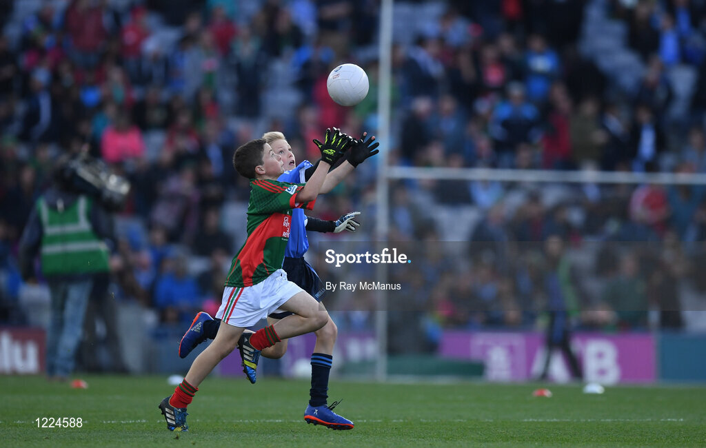 1 October 2016; Oisín Ivers, Kinvara GAA, Kinvara, Galway, representing Mayo, in action against Oscar Maguire, Griffith Barrackss Multidenominational School, Dublin, during the INTO Cumann na mBunscol GAA Respect Exhibition Go Games at the GAA Football All-Ireland Senior Championship Final Replay match between Dublin and Mayo at Croke Park in Dublin. Photo by Ray McManus/Sportsfile