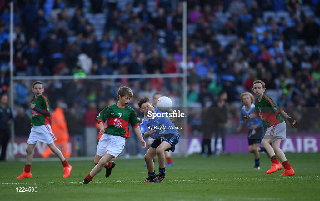 1 October 2016; Lucas Kenny, Crimlin NS, Castlebar, Mayo, in action against Ruadhán McCann, Fingallians GAA, Swords, Dublin, during the INTO Cumann na mBunscol GAA Respect Exhibition Go Games at the GAA Football All-Ireland Senior Championship Final Replay match between Dublin and Mayo at Croke Park in Dublin. Photo by Ray McManus/Sportsfile