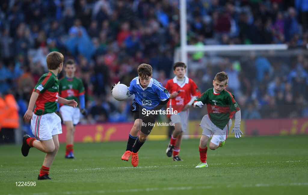 1 October 2016; Alex Drycher, Bayside NS, Sutton, Dublin, in action against Oisín Cronin, Craggagh NS, Kiltimagh, Mayo, during the INTO Cumann na mBunscol GAA Respect Exhibition Go Games at the GAA Football All-Ireland Senior Championship Final Replay match between Dublin and Mayo at Croke Park in Dublin. Photo by Ray McManus/Sportsfile