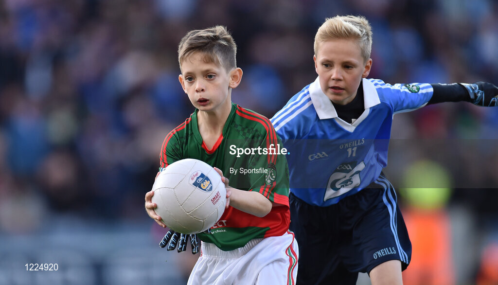 1 October 2016; Martin Mullarkey, Belmullet NS, Belmullet, Mayo, in action against Oscar Maguire, Griffith Barrackss Multidenominational School, Dublin, during the INTO Cumann na mBunscol GAA Respect Exhibition Go Games at the GAA Football All-Ireland Senior Championship Final Replay match between Dublin and Mayo at Croke Park in Dublin. Photo by Sportsfile