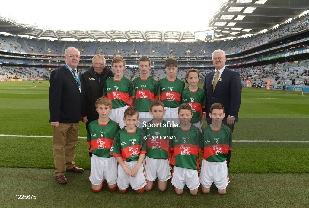 1 October 2016; Mini-Sevens Coordinator Gerry O'Meara, Uachtarán Chumann Lúthchleas Gaeil Aogán Ó Fearghail, with the Mayo team, back row, left to right, Ian Lavelle, Bohola NS, Bohola, Mayo, Dylan McEvoy, Buffers Alley GAA, Wexford, Jack Armstrong, Ardnaree Sarsfields GAA, Ballina, Mayo, Jack Kilbane, SN Béal a'Bhulain Acla, Acaill, Mayo, front row, left to right, Lucas Kenny, Crimlin NS, Castlebar, Mayo, Oisín Cronin, Craggagh NS, Kiltimagh, Mayo, Shay Heneghan, Kilmaine NS, Kilmaine, Mayo, Oisín Ivers, Kinvara GAA, Kinvara, Galway,  Cian Reddington, Carracastle NS, Carracastle, Mayo, ahead of the GAA Football All-Ireland Senior Championship Final Replay match between Dublin and Mayo at Croke Park in Dublin. Photo by Daire Brennan/Sportsfile