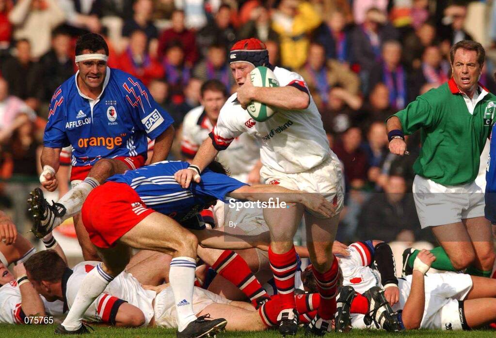 27 October 2001; Neil Doak, Ulster, is tackled by Christophe Dominici, Stade Francais. Stade Francais v Ulster, Heineken Cup,  Stade Jean Bouin, Paris, France. Rugby. Picture credit; Matt Browne / SPORTSFILE  *EDI*