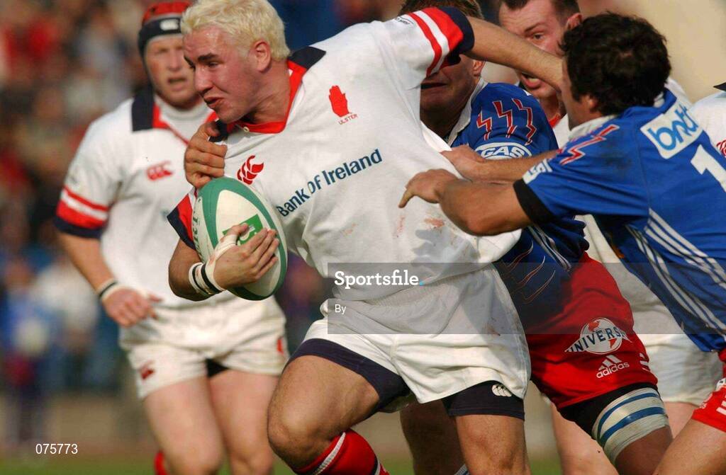 27 October 2001; Paddy Wallace, Ulster, is tackled by Franck Comba, Stade Francais. Stade Francais v Ulster, Heineken Cup,  Stade Jean Bouin, Paris, France. Rugby. Picture credit; Matt Browne / SPORTSFILE  *EDI*