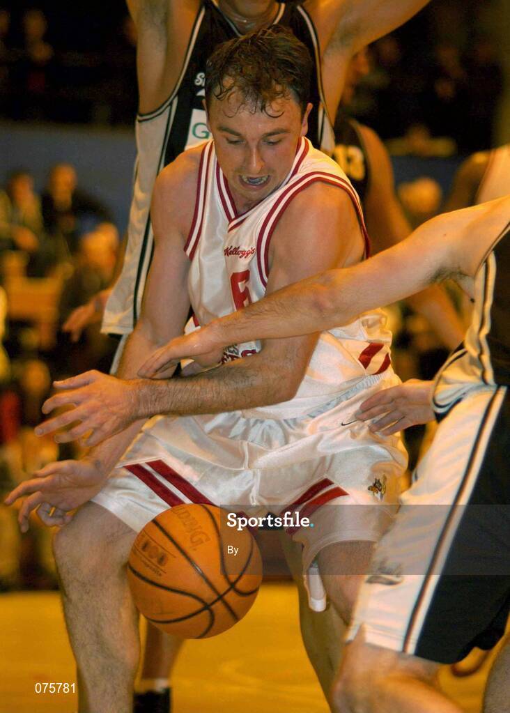 27 October 2001; John Teahan, Frosties Tigers is put under pressure by the Gleneagle Killarney defence. Frosties Tigers v Gleneagle Killarney, ESB Superleague Basketball, Tralee Sports Centre, Tralee, Co. Kerry. Picture credit; Brendan Moran / SPORTSFILE *EDI*