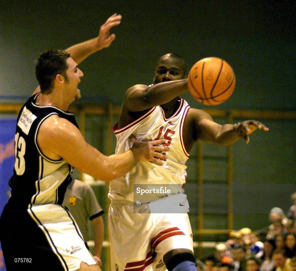 27 October 2001; Ricardo Leonard, (15) Frosties Tigers in action against Garret Brag, Gleneagle Killarney. Frosties Tigers v Gleneagle Killarney, ESB Superleague Basketball, Tralee Sports Centre, Tralee, Co. Kerry. Picture credit; Brendan Moran / SPORTSFILE *EDI*