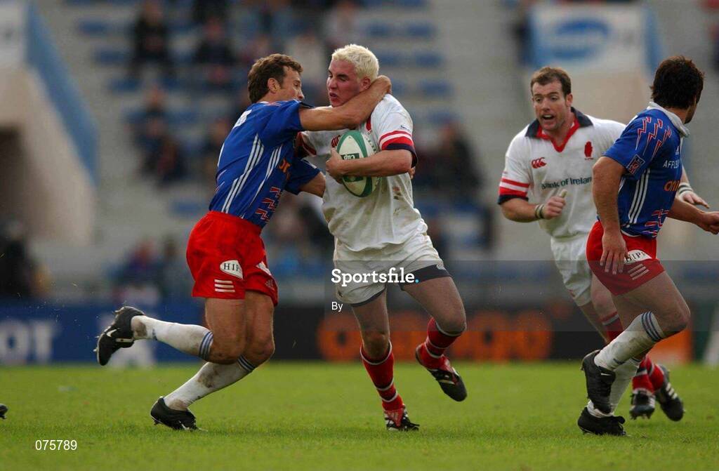 27 October 2001; Paddy Wallace, Ulster, is tackled by Fabien Galthie, Stade Francais. Stade Francais v Ulster, Heineken Cup,  Stade Jean Bouin, Paris, France. Rugby. Picture credit; Matt Browne / SPORTSFILE  *EDI*