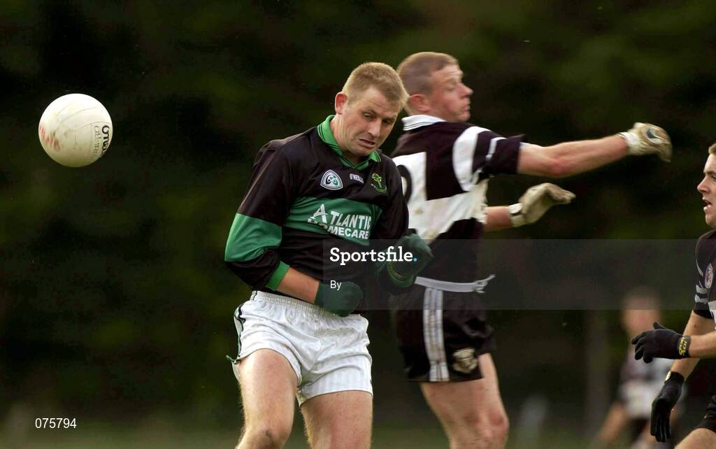 27 October 2001; Niall Corkery, Nemo Rangers, left, in action against Declan Griffin, Doonbeg. Nemo Rangers v Doonbeg, AIB Munster Club Football Championship, Pairc Ui Rinn, Cork. Picture credit; Brendan Moran / SPORTSFILE *EDI*