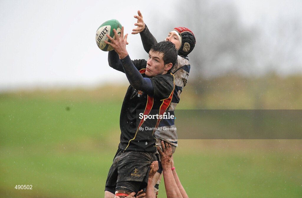 16 February 2011; Eoin McCabe, Ardscoil Ris, wins possession for his side in the lineout ahead of Aidan O'Sullivan, Rockwell College. Avonmore Milk Munster Schools Senior Cup, Ardscoil Ris v Rockwell College, Clanwilliam RFC, Tipperary Town, Tipperary. Picture credit: Diarmuid Greene / SPORTSFILE