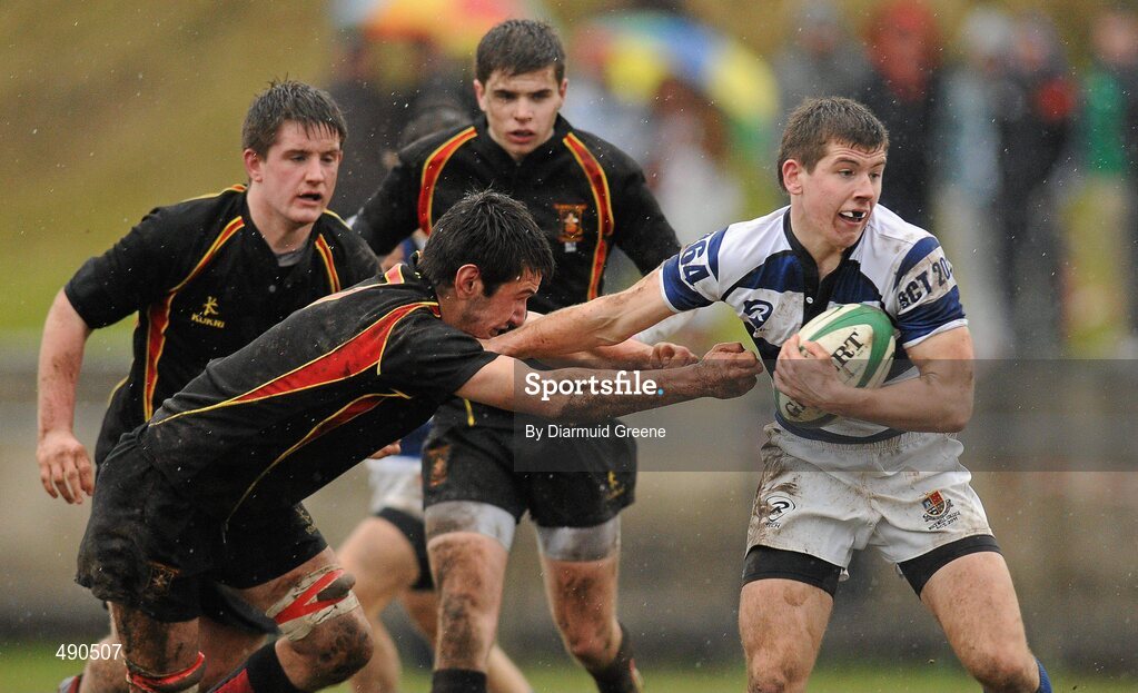 16 February 2011; Killian Kiely, Rockwell College, is tackled by Peter Hodnett, Ardscoil Ris. Avonmore Milk Munster Schools Senior Cup, Ardscoil Ris v Rockwell College, Clanwilliam RFC, Tipperary Town, Tipperary. Picture credit: Diarmuid Greene / SPORTSFILE