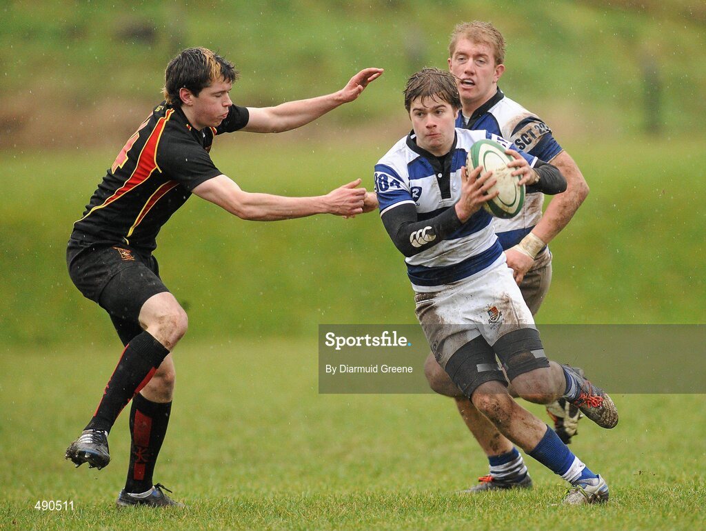 16 February 2011; Donagh McGillycuddy, Rockwell College, is tackled by Kevin Phelan, Ardscoil Ris. Avonmore Milk Munster Schools Senior Cup, Ardscoil Ris v Rockwell College, Clanwilliam RFC, Tipperary Town, Tipperary. Picture credit: Diarmuid Greene / SPORTSFILE