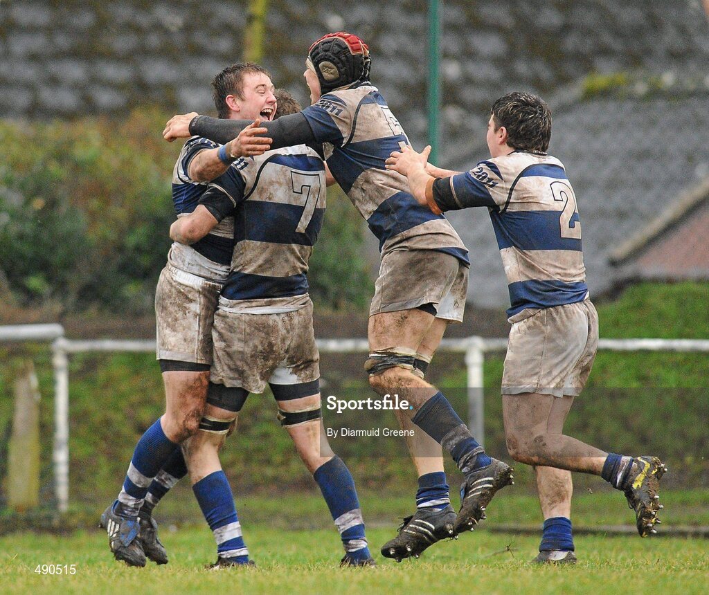 16 February 2011; Brian Haugh, Rockwell College, is congratulated by team-mates Sonny Dwyer, 7, Aidan O'Sullivan, and Darragh Mulcahy, right, after scoring the only try of the game. Avonmore Milk Munster Schools Senior Cup, Ardscoil Ris v Rockwell College, Clanwilliam RFC, Tipperary Town, Tipperary. Picture credit: Diarmuid Greene / SPORTSFILE