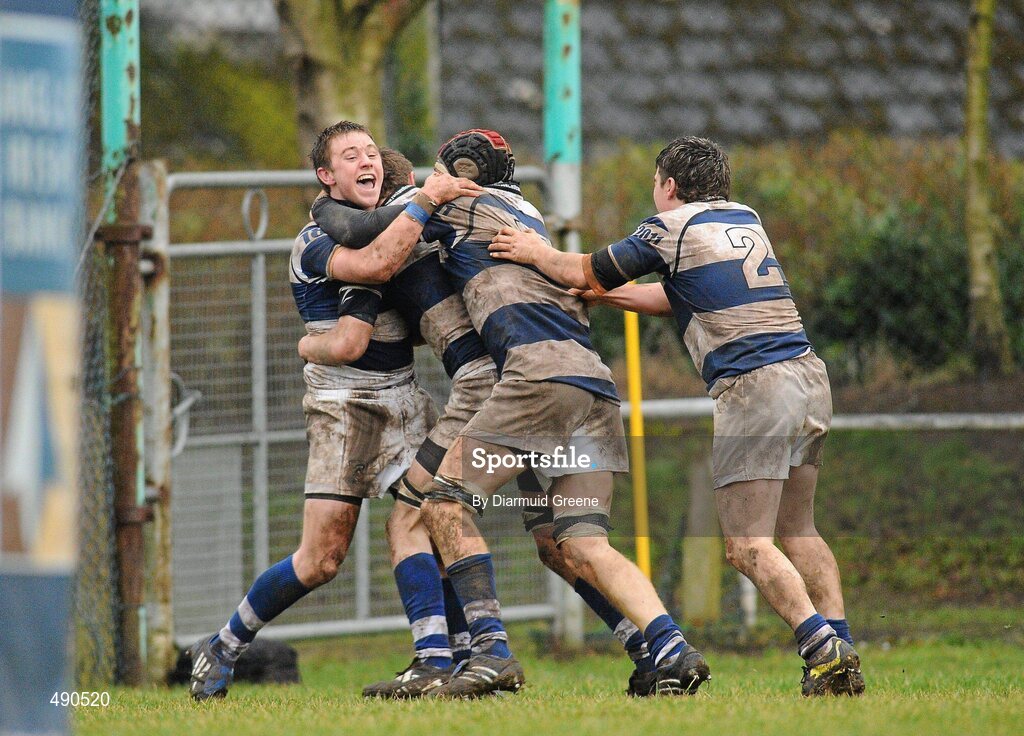 16 February 2011; Brian Haugh, Rockwell College, left, is congratulated by team-mates Sonny Dwyer, Aidan O'Sullivan, and Darragh Mulcahy, after scoring the only try of the game. Avonmore Milk Munster Schools Senior Cup, Ardscoil Ris v Rockwell College, Clanwilliam RFC, Tipperary Town, Tipperary. Picture credit: Diarmuid Greene / SPORTSFILE
