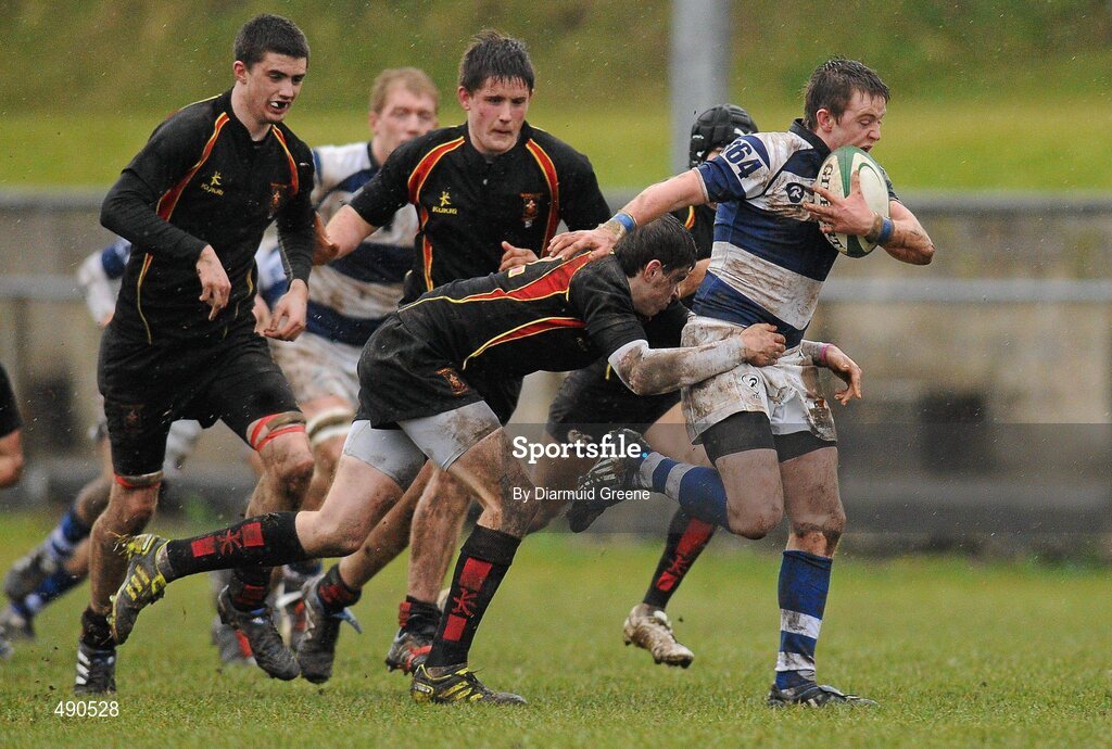 16 February 2011; Brian Haugh, Rockwell College, is tackled by Andrew O'Byrne, Ardscoil Ris. Avonmore Milk Munster Schools Senior Cup, Ardscoil Ris v Rockwell College, Clanwilliam RFC, Tipperary Town, Tipperary. Picture credit: Diarmuid Greene / SPORTSFILE
