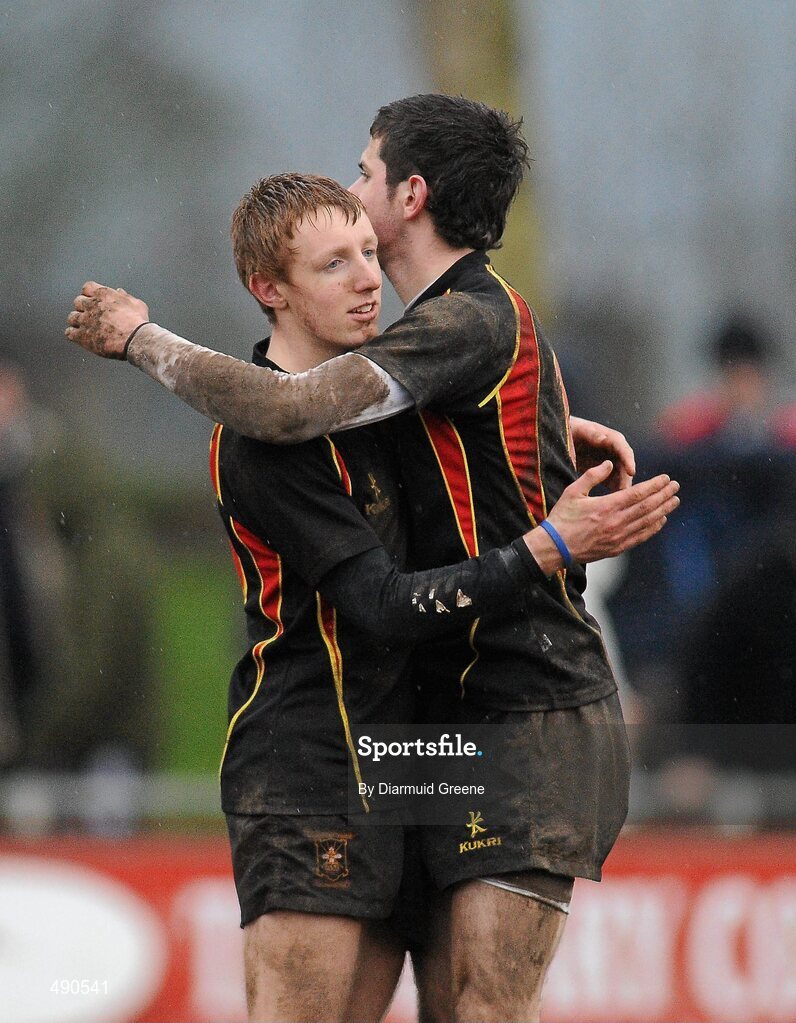 16 February 2011; Conor McLoughlin, left, and Jamie McGarry, Ardscoil Ris, embrace after defeat to Rockwell College. Avonmore Milk Munster Schools Senior Cup, Ardscoil Ris v Rockwell College, Clanwilliam RFC, Tipperary Town, Tipperary. Picture credit: Diarmuid Greene / SPORTSFILE