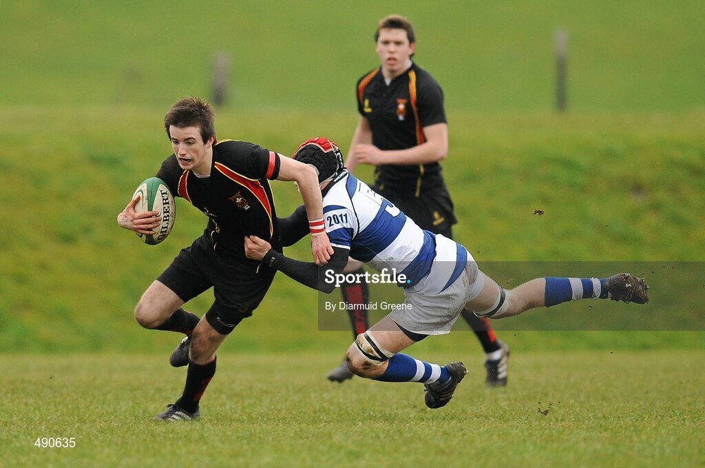 16 February 2011; Sean Noonan, Ardscoil Ris, is tackled by Aidan O'Sullivan, Rockwell College. Avonmore Milk Munster Schools Senior Cup, Ardscoil Ris v Rockwell College, Clanwilliam RFC, Tipperary Town, Tipperary. Picture credit: Diarmuid Greene / SPORTSFILE