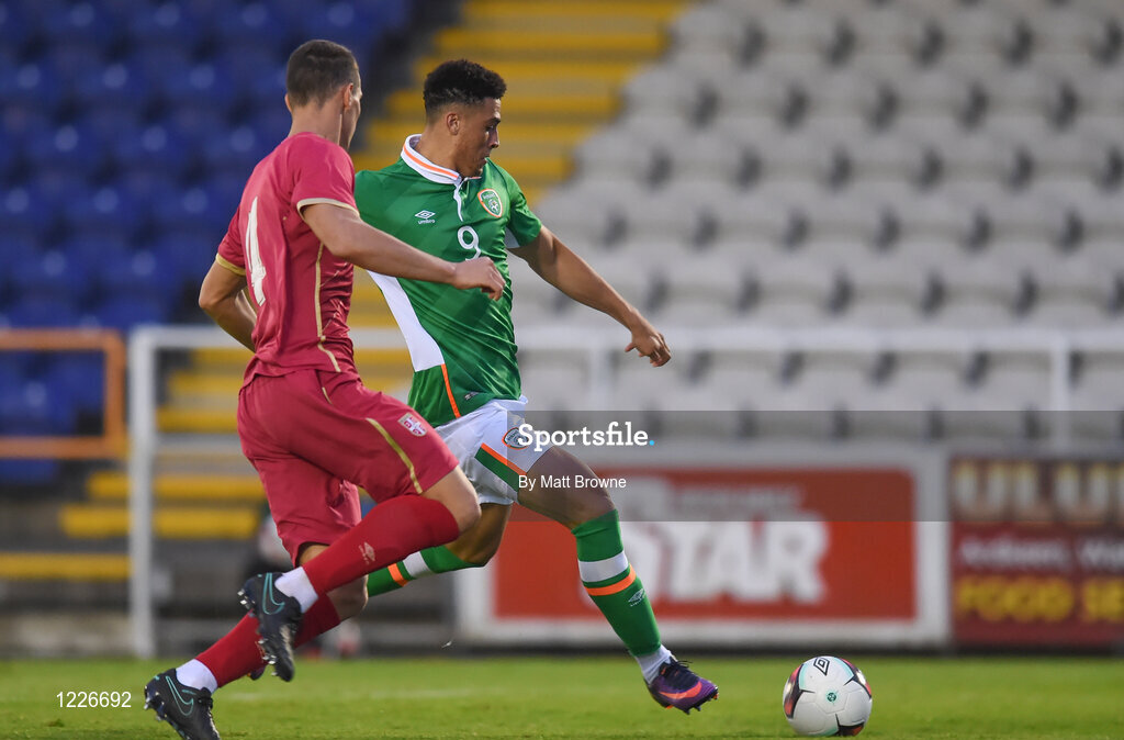 7 October 2016; Courtney Duffus of Republic of Ireland goes past Darko Lazic of Serbia before scoring his side's first goal during the UEFA U21 Championship Qualifier match between Republic of Ireland and Serbia at the RSC, Waterford. Photo by Matt Browne/Sportsfile