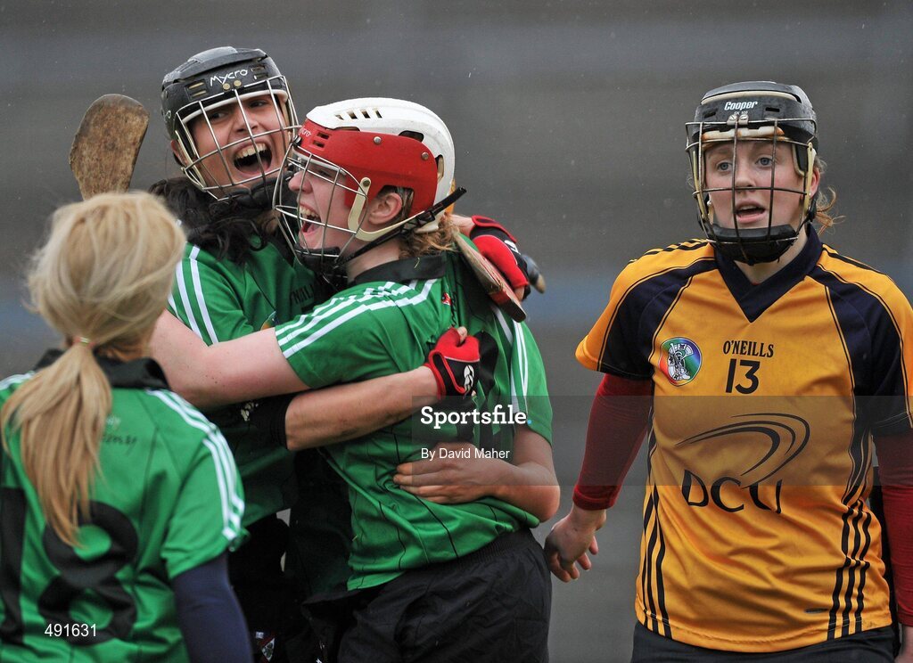 20 February 2011; Mairead Short, left, Queens University Belfast, celebrates with team-mate Ciara Donnelly, as Chrissy Kenny, DCU, looks on. Purcell Cup Final, DCU v Queens University Belfast, Pearse Stadium, Salthill, Galway. Picture credit: David Maher / SPORTSFILE
