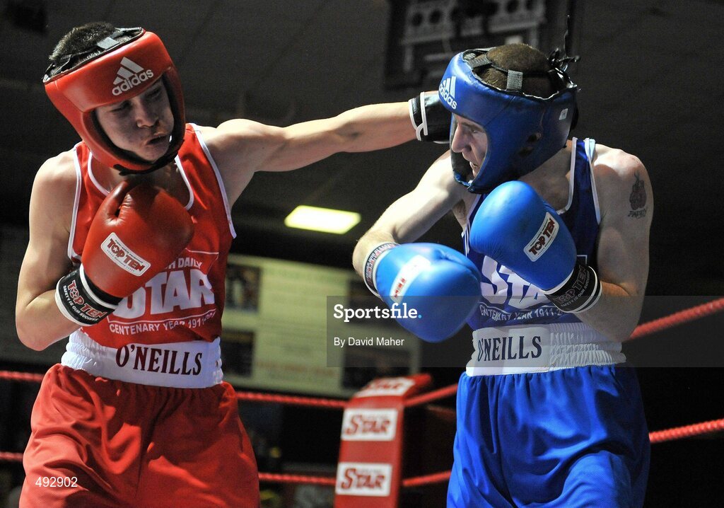 25 February 2011; Evan Metacafe, left, Crumlin Boxing Club, exchanges punches with Paddy Barnes, Holy Family Boxing Club, during their 49kg division bout. National Boxing Championship Finals, National Stadium, Dublin. Picture credit: David Maher / SPORTSFILE