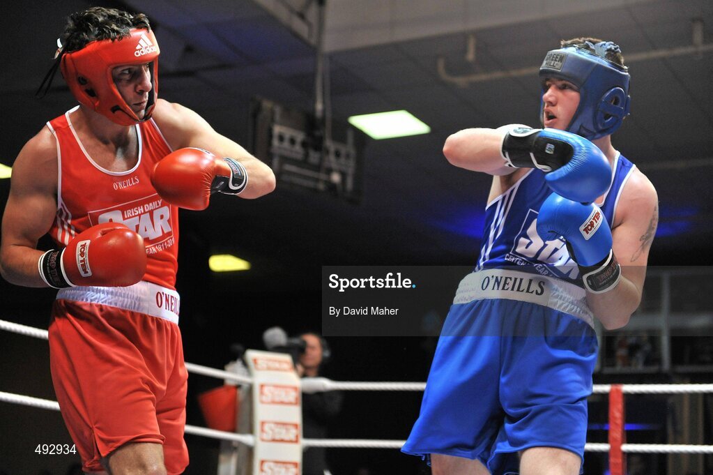 25 February 2011; Kenneth Egan, left, Neiltowns Boxing Club, exchanges punches with Joe Ward, Moate Boxing Club, during their 75kg division bout. National Boxing Championship Finals, National Stadium, Dublin. Picture credit: David Maher / SPORTSFILE