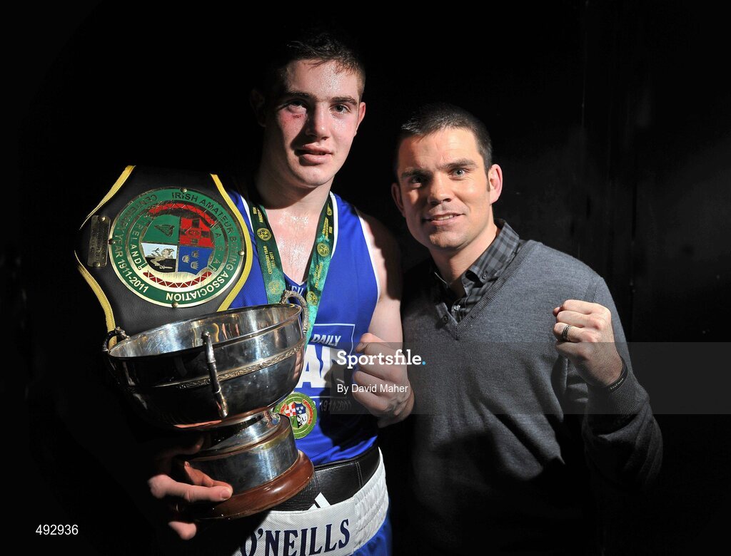 25 February 2011; Joe Ward, Moate Boxing Club, with former WBA Super Bantamweight World Champion Bernard Dunne, after winning his 75kg division bout against Kenneth Egan, Neiltowns Boxing Club. National Boxing Championship Finals, National Stadium, Dublin. Picture credit: David Maher / SPORTSFILE