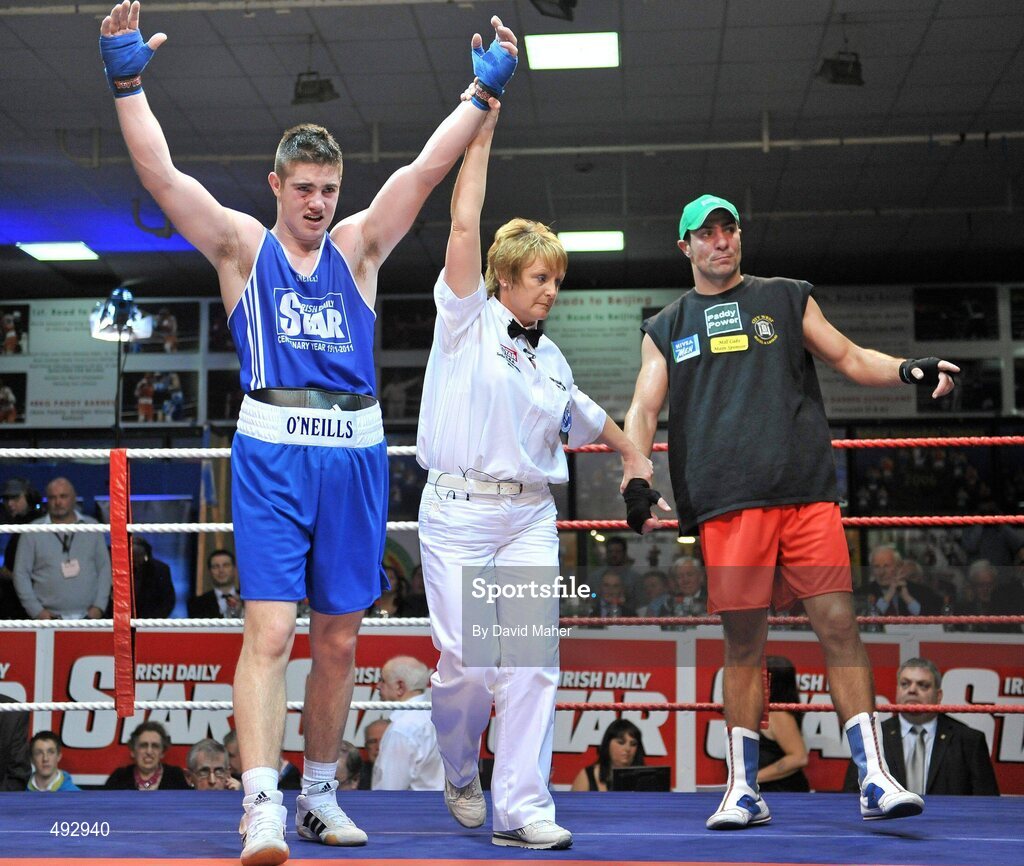 25 February 2011; Joe Ward, Moate Boxing Club, is declared the winner in his 75kg division bout against Kenneth Egan, Neiltowns Boxing Club. National Boxing Championship Finals, National Stadium, Dublin. Picture credit: David Maher / SPORTSFILE