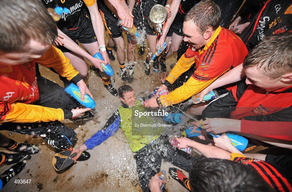 27 February 2011; The Ardscoil Ris team celebrate with manager and teacher Niall Moran in their dressing room after victory over Charleville CBS. Dr. Harty Cup Final, Ardscoil Ris v Charleville CBS, Gaelic Grounds, Limerick. Picture credit: Diarmuid Greene / SPORTSFILE