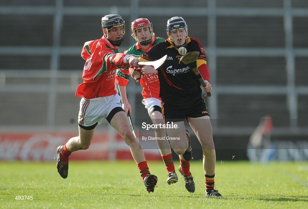 27 February 2011; Martin Moroney, Ardscoil Rís, in action against Mark O'Loughlin, left, and Ciaran Keogh, Charleville CBS. Dr. Harty Cup Final, Ardscoil Ris v Charleville CBS, Gaelic Grounds, Limerick. Picture credit: Diarmuid Greene / SPORTSFILE