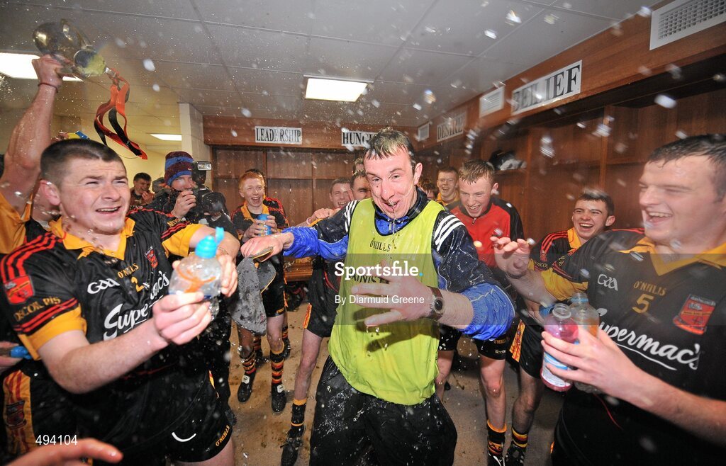 27 February 2011; The Ardscoil Rís team celebrate with manager and teacher Niall Moran in their dressing room after victory over Charleville CBS. Dr. Harty Cup Final, Ardscoil Ris v Charleville CBS, Gaelic Grounds, Limerick. Picture credit: Diarmuid Greene / SPORTSFILE