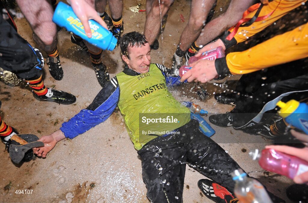 27 February 2011; The Ardscoil Rís team celebrate with manager and teacher Niall Moran in their dressing room after victory over Charleville CBS. Dr. Harty Cup Final, Ardscoil Ris v Charleville CBS, Gaelic Grounds, Limerick. Picture credit: Diarmuid Greene / SPORTSFILE