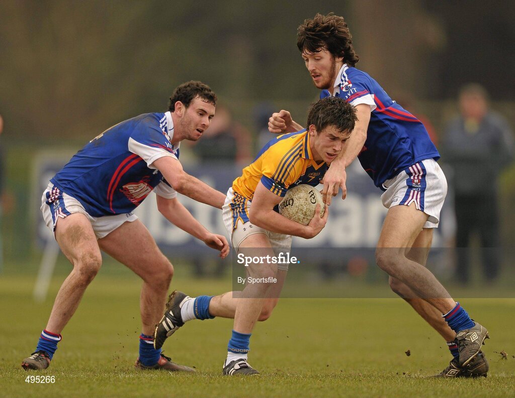 5 March 2011; Michael Brady, Colaiste Phadraig in action against Colm Coss, left, and Tommy Prendergast, WIT. Trench Cup Final, Colaiste Phadraig v WIT, New GAA, UCD, Belfield, Dublin. Photo by Sportsfile