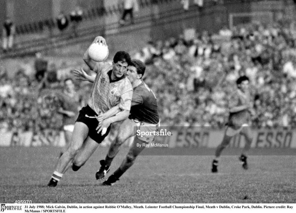 31 July 1988; Mick Galvin of Dublin in action against Robbie O'Malley of Meath during the Leinster Football Championship Final match between Meath and Dublin at Croke Park, Dublin. Photoby Ray McManus/Sportsfile