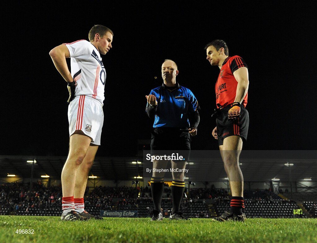 12 March 2011; Referee Derek Fahy, Longford, conducts the coin toss with Cork captain Patrick Kelly and Down captain Danny Hughes, right. Allianz Football League, Division 1, Round 4, Cork v Down, Pairc Ui Rinn, Cork. Picture credit: Stephen McCarthy / SPORTSFILE